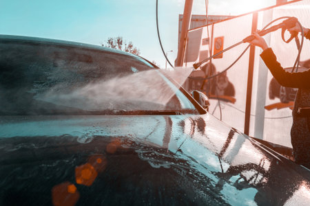 Car wash, clean foam service. Wax vehicle. Hand carwash with water and soap. Auto cleaner station....