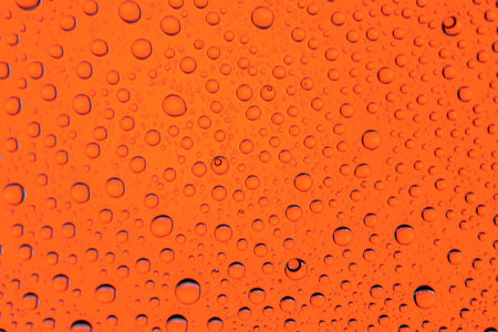 Water drops on window glass. Rain texture or wet pattern backgroundの写真素材