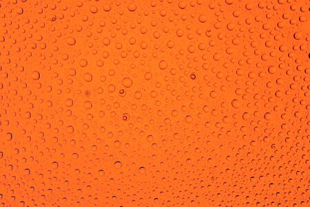 Water drops texture background. Rain on window glass. Wet rain pattern.の写真素材