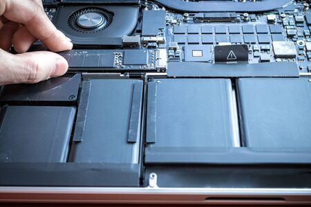 Computer macro technician engineer service. Electronic hardware repair. Technology maintenance pc from man.の写真素材