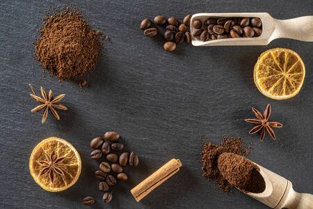 Food, drink caffeine background. Dark coffee beans for cup of black espresso breakfast in cafe. Morning energy concept and cheerfulness or evening refreshment. Copy space, top view.の写真素材
