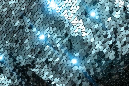 Sequins isolated. Mermaid glitter fabric texture. Colorful mermaid sequins woman.の写真素材