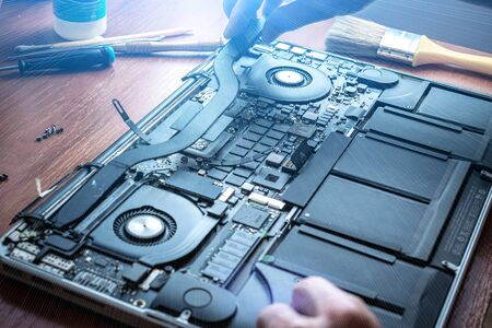 Solutions services electronic hardware. Engineer technician man upgrade and maintenance digital pc. Technology chip equipment repair.の写真素材