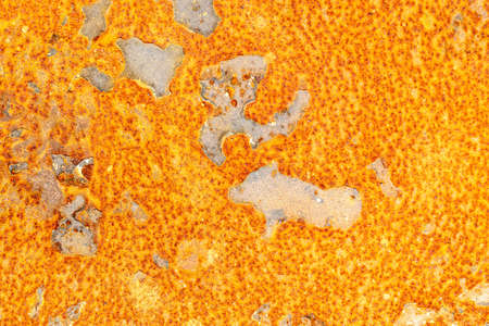 Steel background. Metal wall pattern. Yellow steel plate texture for iron sheet material background. Concept of metal processingの写真素材