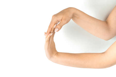 Finger exercise. Female finger charge, stretch therapy for pain wrist protective isolated on white background. Healthy workout exercise. Woman hand massage for carpal tunnel syndrome protection.の写真素材