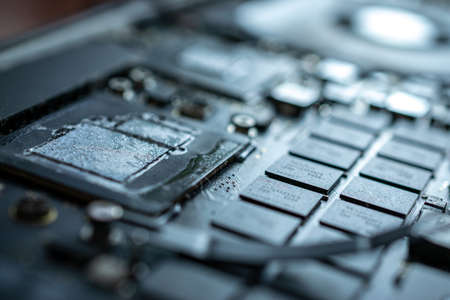 Computer service. Technology repair of pc electronic equipment. Technician engineer man do maintenance of hardwareの写真素材