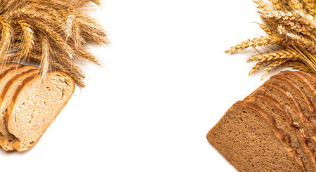 Sliced Multigrain. Rye bakery with crusty loaves and crumbs. Fresh loaf of rustic traditional bread...