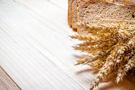 Rye bread. Bakery with crusty loaves and crumbs. Fresh loaf of rustic traditional bread with wheat...