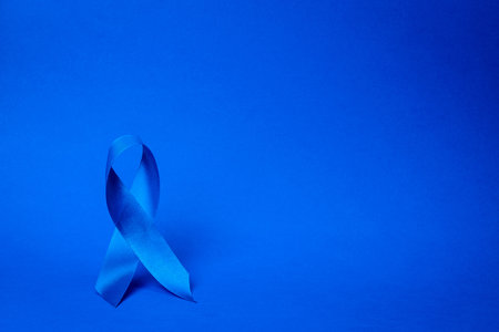 Blue prostate ribbon. Awareness of men health in November with blue prostate cancer ribbon isolated...