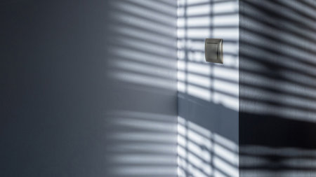 Architectural shadows. Sunlight architecture abstract background with light, black shadow overlay from window on white texture wall. Mockups, posters, stationary, wall art, design presentationの写真素材