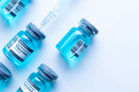 Protection disease. Medical syringe with needle for protection flu virus and coronavirus. Covid vaccine isolated on white. Nurse or doctor. Liquid drug or narcoticの写真素材