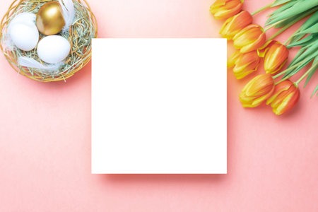 Easter card. Golden, white color egg in basket with spring tulips, feathers on pastel pink...