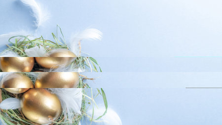 Easter egg. Happy Easter decoration: Golden eggs in basket with white feathers on pastel blue...