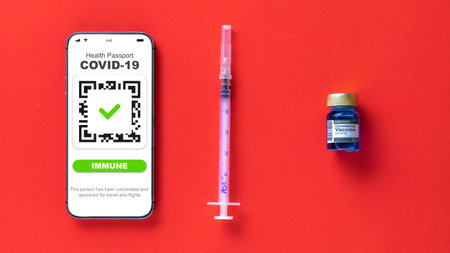 Coronavirus passport. Covid vaccination certificate or vaccine passport on smartphone screen with...