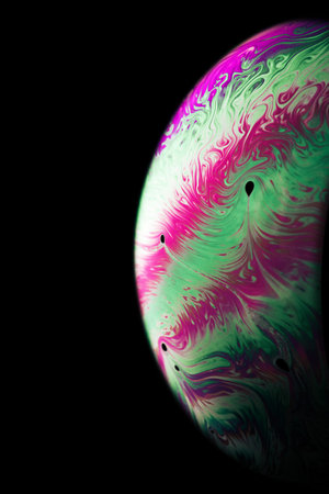 Colorful bubbles. Globe planet earth in galaxy universe space with abstract sun on black background....