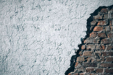 Bad paint. Vintage grunge plaster or concrete stucco surface. Old rough stone on cement pattern wall background. Natural abstract material decoration conceptの写真素材