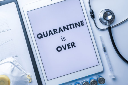 End of quarantine. Medical equipment: doctor stethoscope, hospital healthcare charts, syringe with...