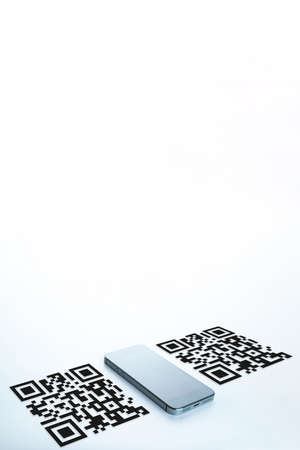 Code scan icon. Digital mobile smart phone with qr code scanner on smartphone screen for payment pay, scan barcode technology. Online bill payment conceptの写真素材