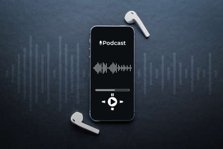 Podcast music. Mobile smartphone screen with podcast application, sound headphones. Audio voice with radio microphone on black background. Broadcast media music banner with copy spaceの写真素材