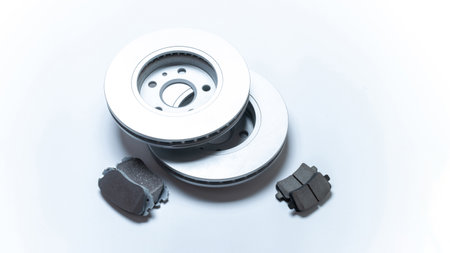 Car service tools. New metal car part. Auto motor mechanic spare or automotive piece isolated on white background. Technology of mechanical gear with space for textの写真素材