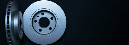 Silent blocks. New metal car part. Auto motor mechanic spare or automotive piece isolated on dark...