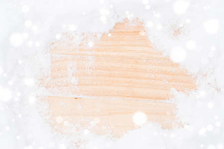 Snow wood. Winter wooden texture background. Christmas board with old rustic wall, white frozen ice. Merry Christmas holiday card patternの写真素材