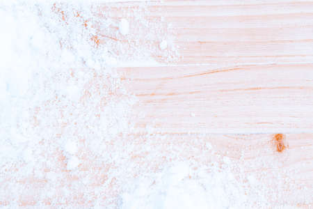 Winter wood. Winter board with old rustic wall, white frozen snow. Winter wooden texture background. inimal flat layの写真素材