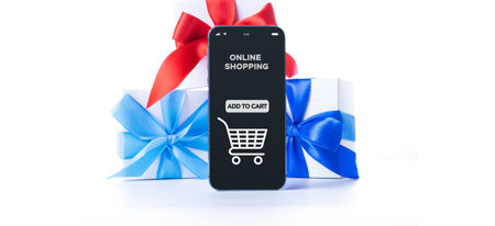 Online gift. Internet shop application on digital smartphone screen with gift box red ribbon in...