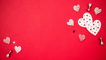 Valentine greeting card. Red heart, romantic gift on love red background. Valentines day decoration for flat lay card with copy spaceの写真素材