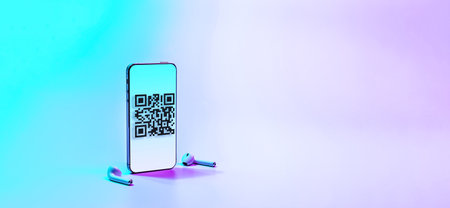 Qr code mobile. Digital smart phone with qr code scanner on smartphone screen for online pay, scan barcode technology on neon background. Qrcode payment, online shopping, cashless technology conceptの写真素材