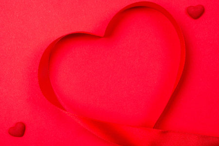 Valentines day card. Red heart, romantic gift on love red background with copy space. Valentine...