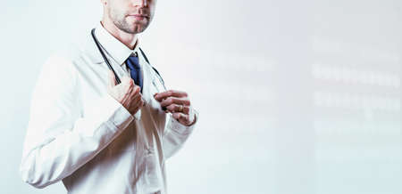 medical doctor hospital background. Happy nurse in hospital uniform, blue gloves holding patient clipboard isolated on white. Medical care, insurance, prescription, paper work or career conceptの写真素材