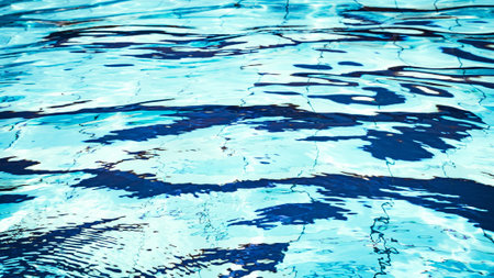Clear water surface. Blue wave texture, pool water background. Abstract summer sea pattern