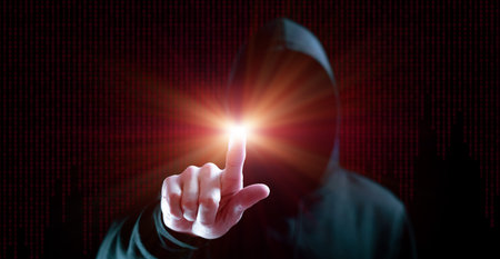 Hacker security cyber attack. Hacker man hand isolated on black. Blurred internet web hack...