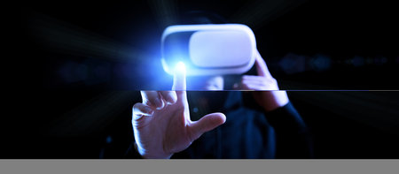 Vr helmet virtual reality. Model young in digital glasses for virtual reality technology on dark...