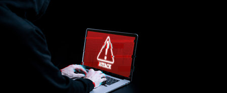 Cyber hacker attack concept. Internet web hack technology. Blurred Digital laptop in hacker man hand...