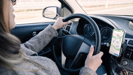 gps navigator map system. Global positioning system on smartphone screen in auto car on travel road....