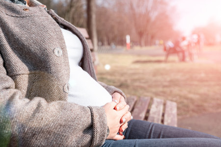 Pregnancy woman walk. Pregnant nature walk. Happy maternity mother in summer park. Baby belly....