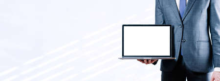business man computer screen. businessman holding notebook. Empty blank mockup laptop screen on white background. Monitor template for mockupの写真素材