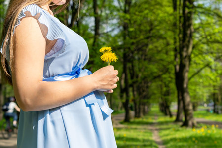 Pregnancy woman walk. Pregnant nature walk. Happy maternity mother in summer park. baby belly....
