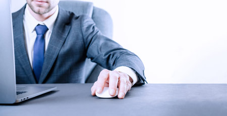 Laptop businessman working notebook. Businessman computer online technology on white background. Analyzing data growth chartの写真素材