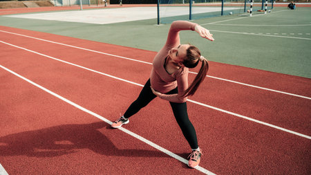 Pregnancy running. Prenatal healthy fitness active fit gym outside. Pregnant woman training yoga sport exercise. Pregnancy exerciseの写真素材