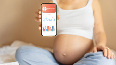 Pregnancy app. Mobile pregnancy online maternity application. Pregnant mother using phone....