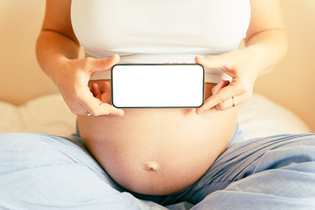 Pregnancy device mockups. Mobile pregnancy online maternity application. Pregnant mother using phone...