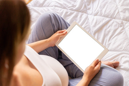 Pregnancy mockup digital tablet. Pregnant woman holding smart tablet. Mobile pregnancy online...