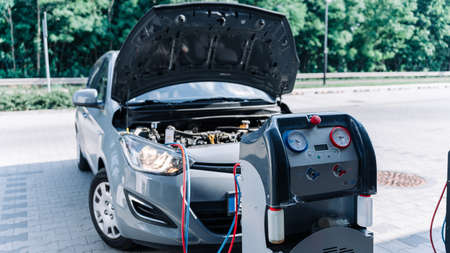 Ac car air repair conditioner service. Check automotive vehicle conditioning system and refill automobile ac compressor. Auto car conditioner repairの写真素材