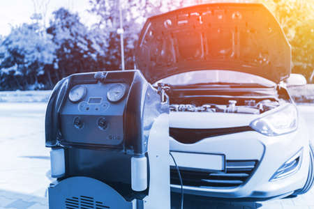 Car conditioning air ac repair service. Check automotive vehicle conditioning system and refill automobile ac compressor. Diagnostic auto car conditioner serviceの写真素材