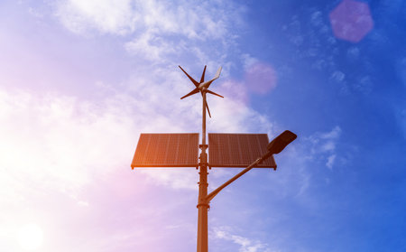 Renewable energy sources. Wind turbine with solar energy power panel, renewable photovoltaic technology. alternative concept energyの写真素材
