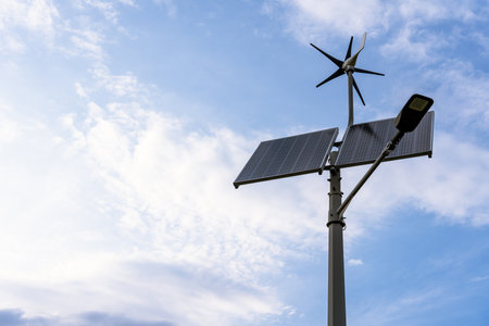 alternative energy sources. Renewable photovoltaic technology with solar energy power panel and wind turbine. Sun energy solar power conceptの写真素材