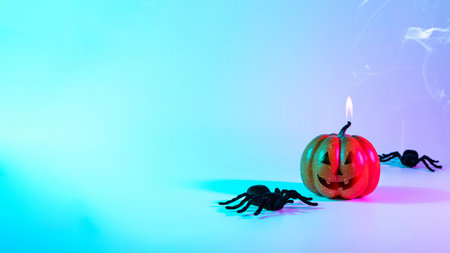 happy halloween. Black night spider, scary spooky pumpkin on night neon helloween background. Happy Halloween concept. frame. copy spaceの写真素材